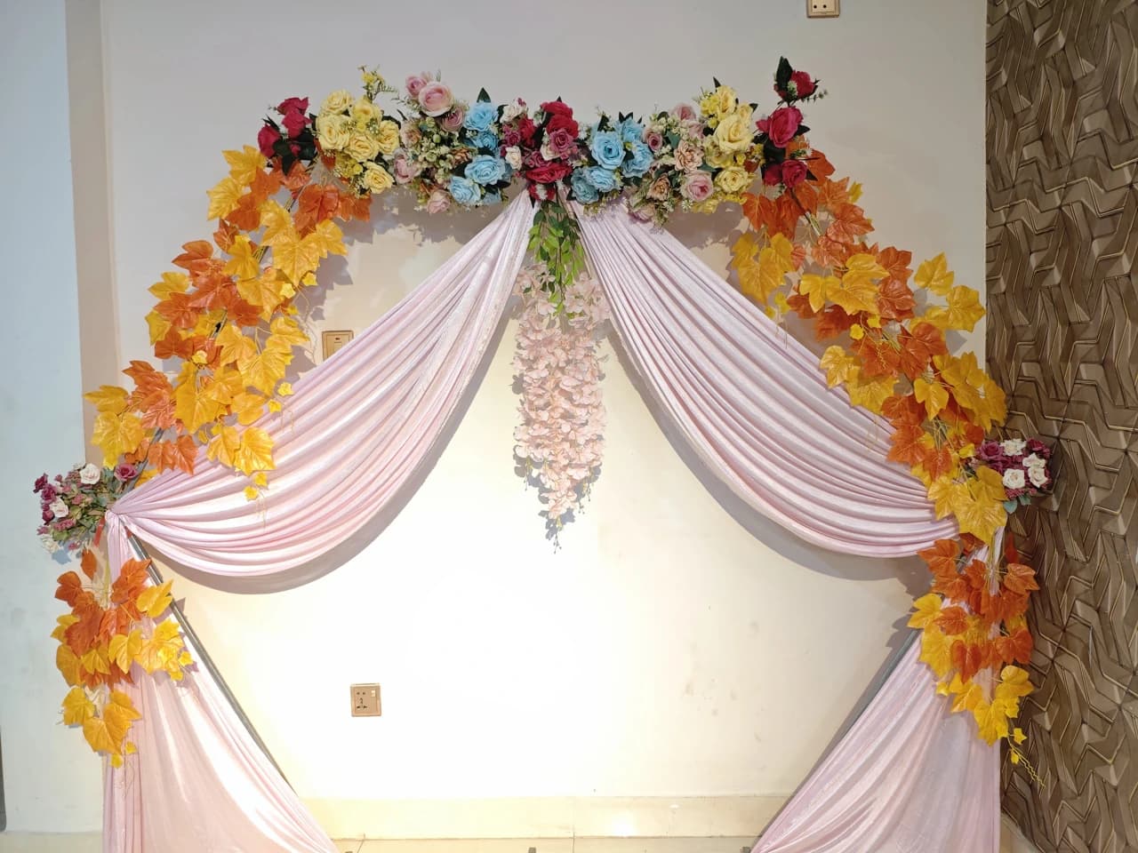 Floral decorated entrance arch at Crystal Community Center, Gobindaganj